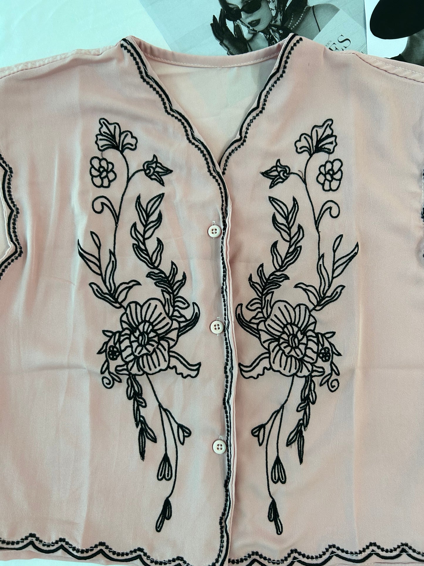 Pink embroidered vest